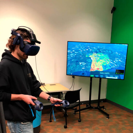 Virtual Reality. Student interacting with TimberOps VR Immersive Analytics Platform